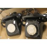 A PAIR OF VINTAGE BLACK DIAL TELEPHONES