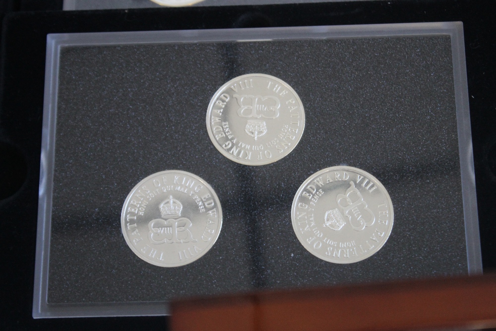 A COLLECTION OF BOXED COMMEMORATIVE COINS, to include three Edward VIII retro sets, a set of St - Image 2 of 6
