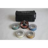 A GREYS GRXI+ 7/8 CARTRIDGE SPOOL FLY REEL and four spare spools not marked in zipped padded pouch¦