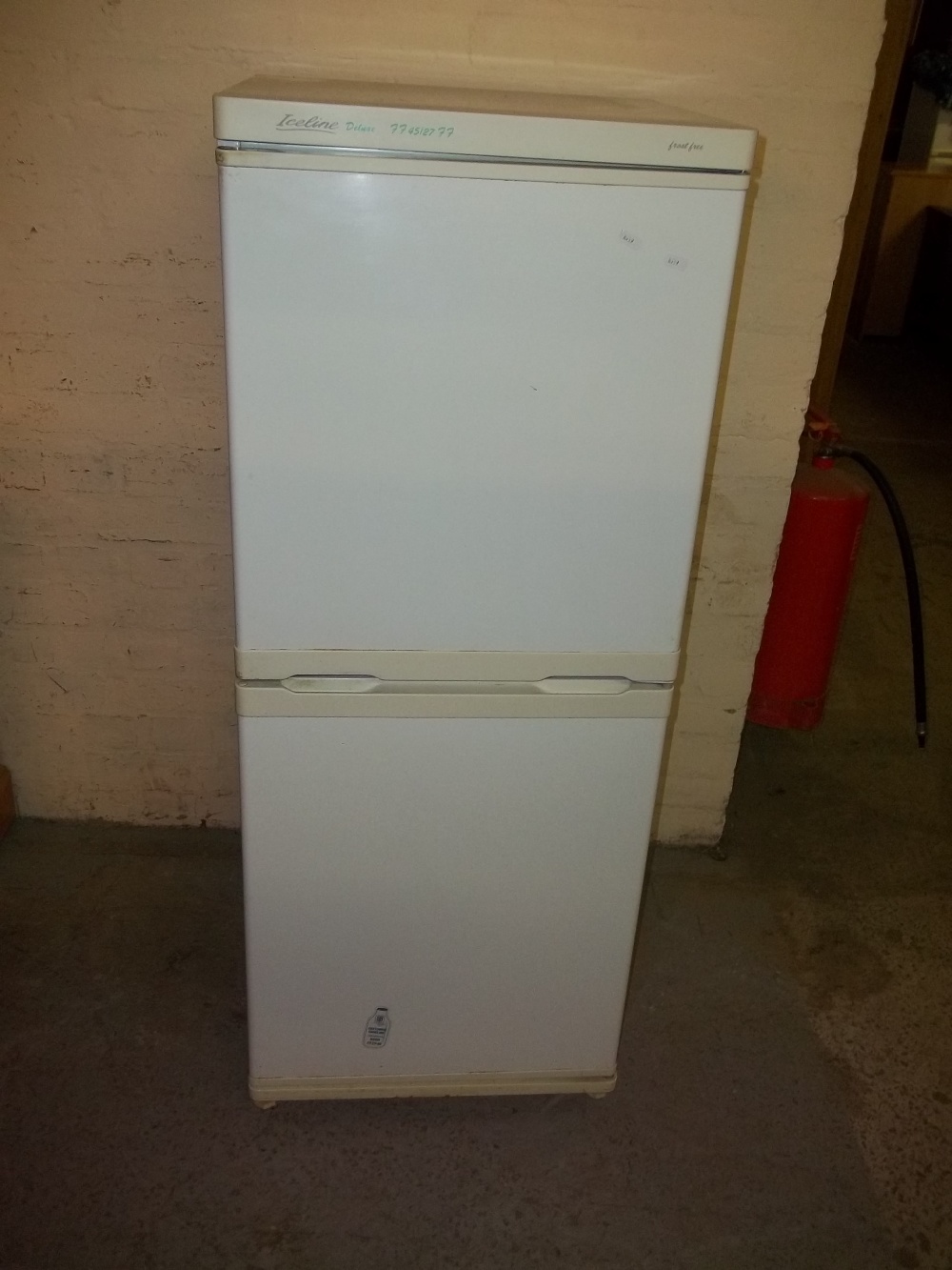 AN ICELINE FROST FREE FRIDGE FREEZER