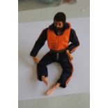 A VINTAGE ACTION MAN EAGLE EYES FIGURE WITH DARK FLOCK HAIR AND BEARD, in flying suit and USAF