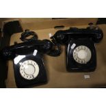 A PAIR OF VINTAGE BLACK DIAL TELEPHONES