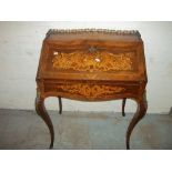 A LOUIS XV STYLE WRITING DESK WITH BROKEN LOCK