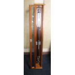 A STICK BAROMETER, F. D. & Co., Watford in a mahogany case