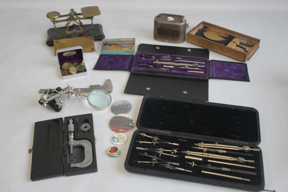 A BOX OF COLLECTABLES, to include postal scales, money box, weights, drawing sets etc