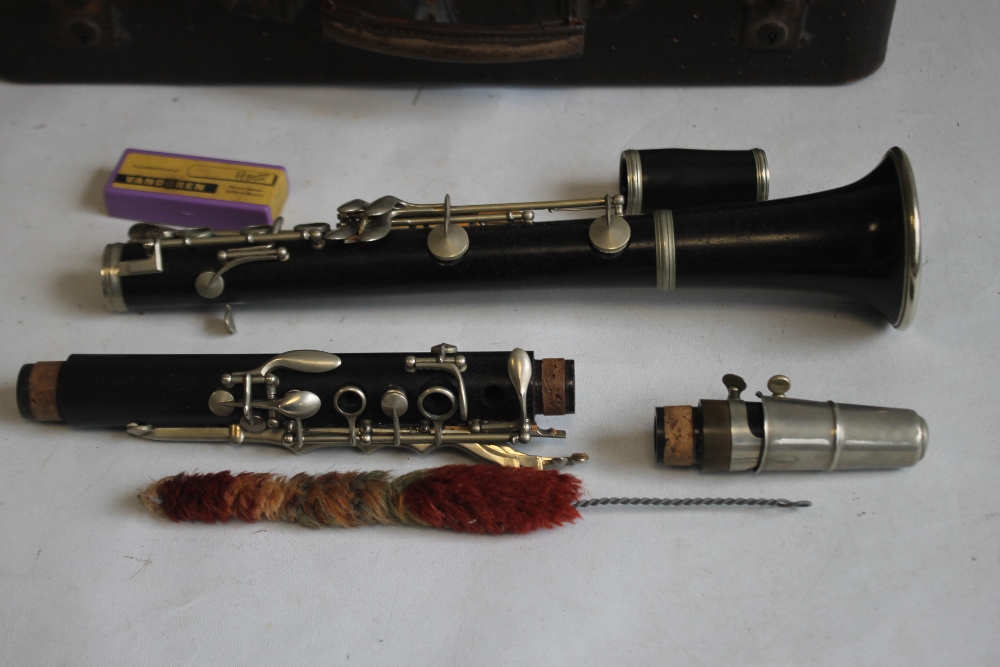 A CASED F. BUISSON B FLAT CLARINET, with cleaner and spare reeds, plate on case reads "John E. - Image 2 of 5