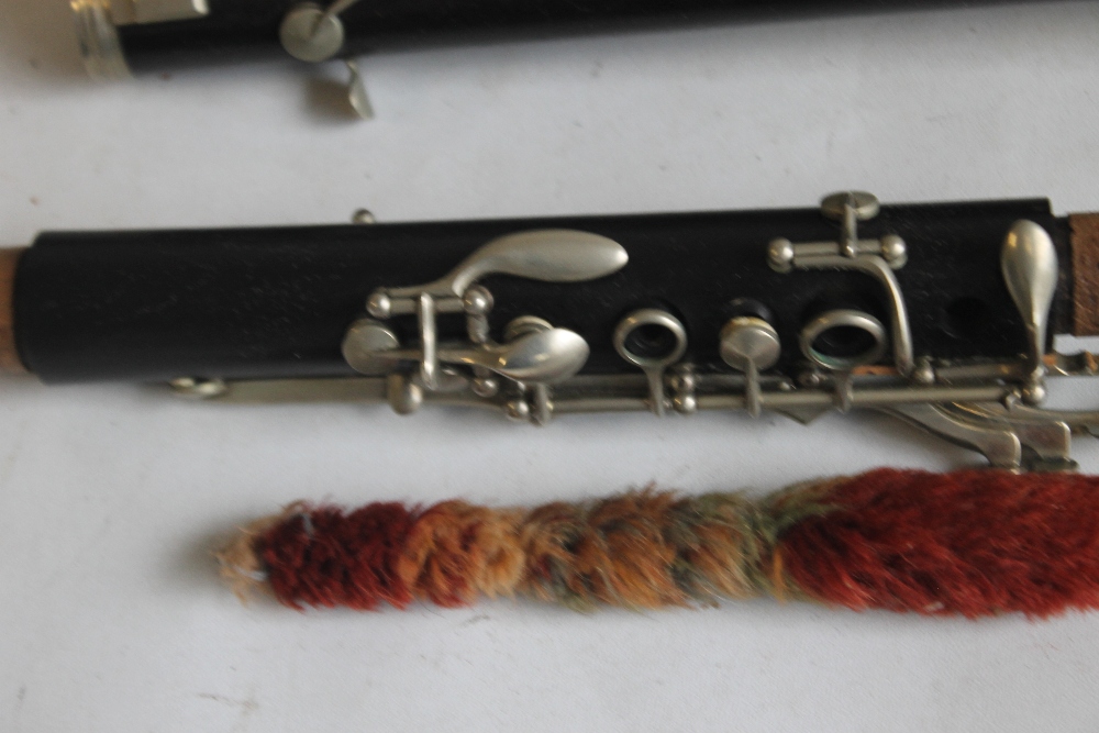 A CASED F. BUISSON B FLAT CLARINET, with cleaner and spare reeds, plate on case reads "John E. - Image 5 of 5