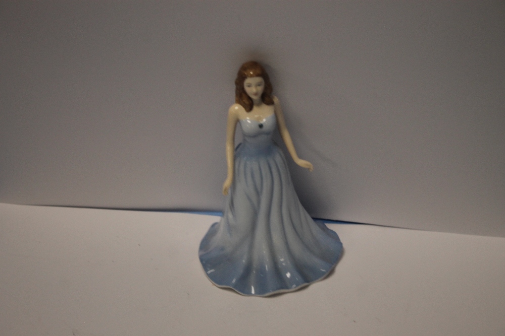 A ROYAL DOULTON FIGURINE, 'MARCH'