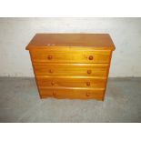 A PINE FOUR DRAWER CHEST OF DRAWERS