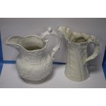 A ROYAL WORCESTER CREAM COLOURED JUG TOGETHER WITH A PORTMEIRION CREAM COLOURED JUG¦Condition