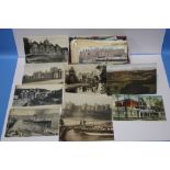 A SMALL COLLECTION OF POSTCARDS to include mainly topographical examples