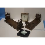 TWO WOODEN BOOK STANDS, A MANTEL CLOCK AND A MAGNIFYER