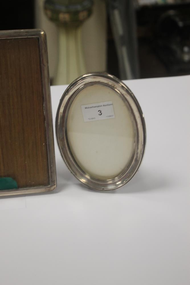 TWO HALLMARKED SILVER PICTURE FRAMES together with a white metal frame, the largest 23 x 17.5 cm - Image 3 of 3