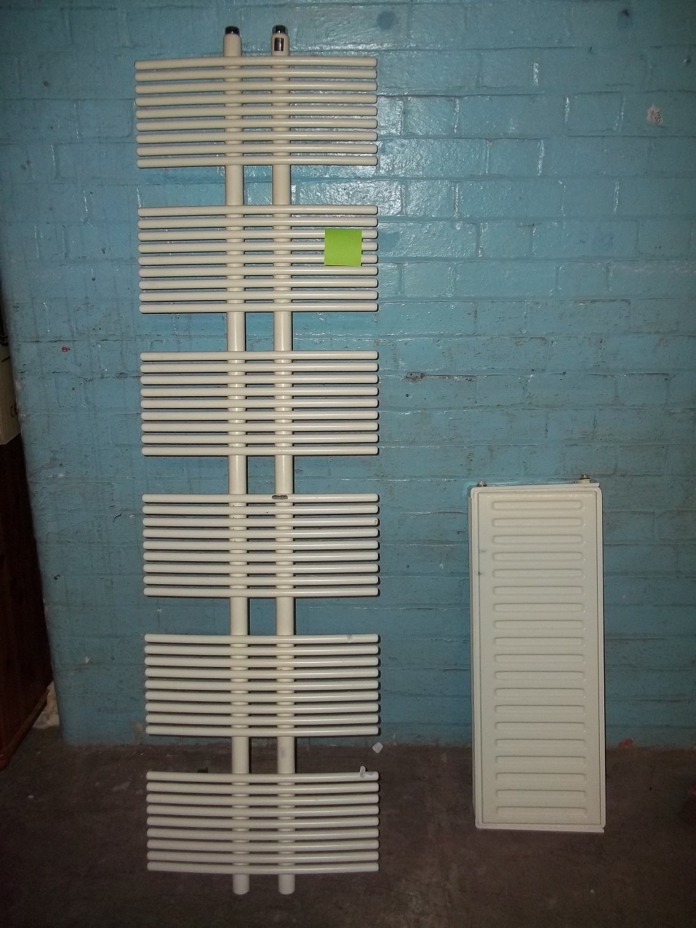 TWO CENTRAL HEATING RADIATORS AND FITTINGS