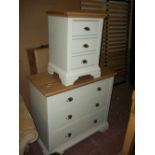 A FOUR DRAWER WIDE CHEST OF DRAWERS, TWO OVER TWO (AS NEW) AND A THREE DRAWER NARROW CHEST OF