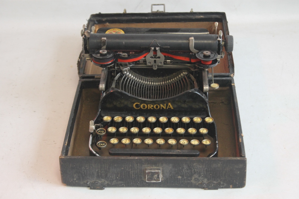 A SMALL CORONA FOLDING TYPE-WRITER, in case