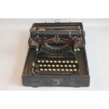 A SMALL CORONA FOLDING TYPE-WRITER, in case