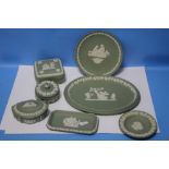 A SMALL COLLECTION OF GREEN WEDGWOOD JASPERWARE to include trinket boxes