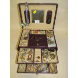 A JEWELLERY BOX AND CONTENTS, TO INCLUDE NECKLACES, RINGS, BROOCHES ETC.