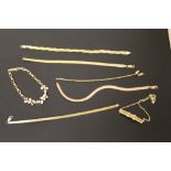 A SMALL COLLECTION OF SILVER GILT NECKLACES ETC.