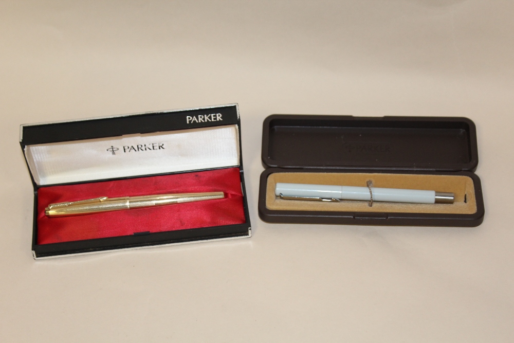 TWO BOXED PARKER FOUNTAIN PENS, ONE ROLLED GOLD CASE WITH 14 CARAT GOLD NIB