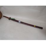 A 20TH CENTURY KATANA WITH LEATHER COVERED SCABBARD