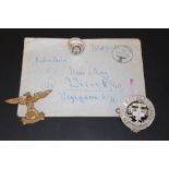 A GERMAN LETTER AND PHOTOGRAPH, NAZI RING, AND BADGES