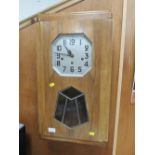 A LARGE WESTMINSTER DECO WOODEN CLOCK