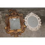 AN ORNATE GILT FRAMED MIRROR - OVERALL HEIGHT 54CM TOGETHER WITH AN ORNATE OVAL PICTURE FRAME (2)