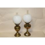 A PAIR OF OIL LAMPS