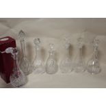 A TRAY OF SEVEN CRYSTAL DECANTERS TO INCLUDE ROYAL ALBERT EXAMPLES