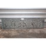 A METAL PANEL DEPICTING CHERUBS DRINKING AND PLAYING MUSIC - SIZE 18.75CM X 71.5CM
