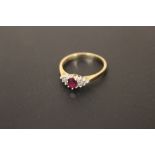 A HALLMARKED 9 CT RUBY AND DIAMOND DRESS RING, APPROX WEIGHT 2.2 G