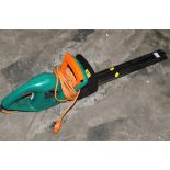AN ELECTRIC STRIMMER
