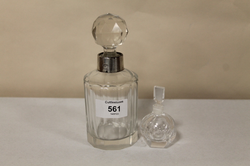 A HALLMARKED SILVER COLLARED SCENT BOTTLE, TOGETHER WITH A SMALLER ORREFORS CRYSTAL EXAMPLE