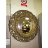 A GILT FRAMED CONVEX WALL MIRROR - OVERALL DIA. 56 CM