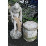 A CHERUBIC DESIGN STONE PLINTH TOGETHER WITH A STONE NUDE FEMALE FIGURE