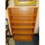 A RETRO TEAK OPEN FRONTED BOOKCASE, W 81 CM, A/F