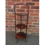 A MAHOGANY THREE TIER DUMB WAITER