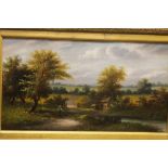 AN ANTIQUE GILT FRAMED OIL ON CANVAS OF A COUNTRY RIVER LANDSCAPE WITH FIGURES AND COTTAGE SIGNED