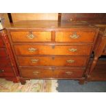 AN ANTIQUE OAK AND MAHOGANY CROSS BANDED FIVE DRAWER CHEST A/F - W 107 cm