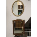 AN EDWARDIAN STYLE BEVEL EDGED DRESSING MIRROR COMPLETE WITH TWO BRUSHES TOGETHER WITH A GILT FRAMED