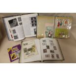 A TOWER STAMP ALBUM, TOGETHER WITH AN ALBUM OF VINTAGE CHRISTMAS CARDS AND THREE COLLECTORS GUIDES