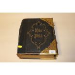 AN ANTIQUE LEATHER BOUND HOLY BIBLE