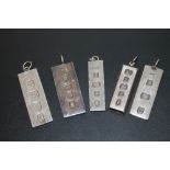 A SELECTION OF SILVER INGOT PENDANTS - APPROX 140.1