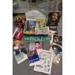 A BOX OF ELVIS PRESLEY MEMORABILIA TO INCLUDE CALENDARS, MODERN ENAMEL SIGNS ETC. AND A BOX OF