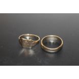 AN UNMARKED YELLOW METAL SIGNET RING, TOGETHER WITH A BAND STAMPED 9CT THREE TIMES (UNTESTED),