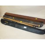 A COLLECTION OF VINTAGE SNOOKER CUES TO INCLUDE A MAHOGANY CASED EXAMPLE (4)