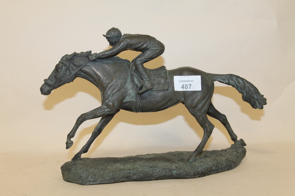 A COLD CAST BRONZE MODEL OF A HORSE