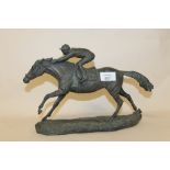 A COLD CAST BRONZE MODEL OF A HORSE